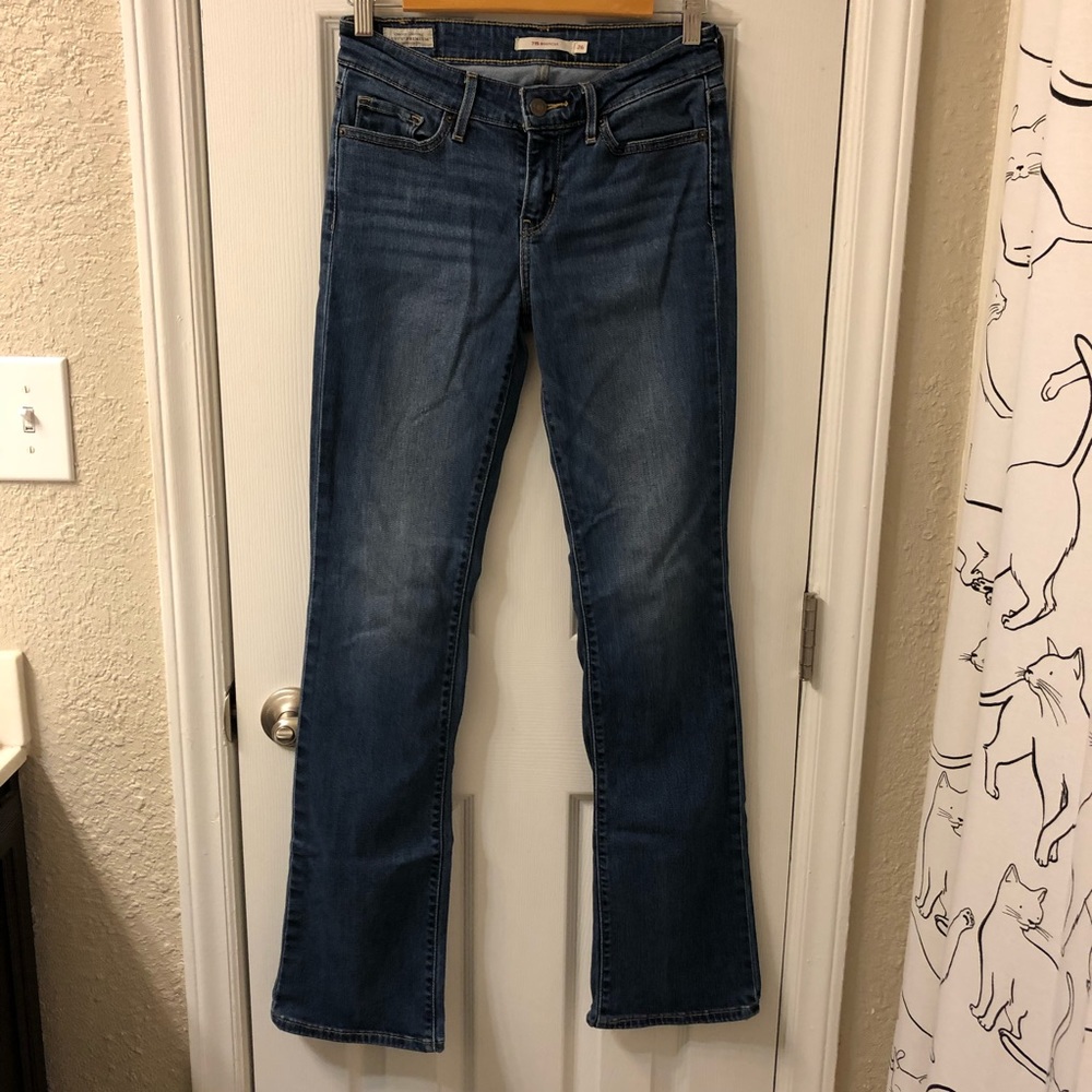 Levi’s 715 women’s medium wash bootcut jeans 26